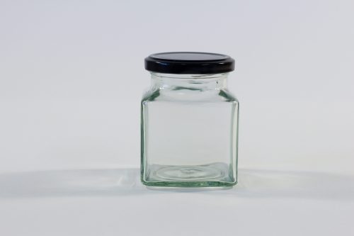 200 gram Square glass jar with lid. Food grade packaging perfect for honey, jams, confectionarys and chutneys.