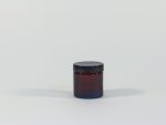 60ml amber glass jar with black lid. From our glass packaging range.