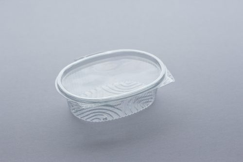 250 ml oval salid container with hinged lid. From our plastic packaging range.