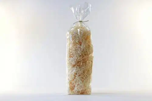 Cellophane Bags For Bottles Of Wine On White Background.