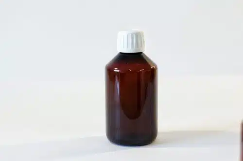 250ml amber PET Bottle with 28mm white lid. From our Pharmaceutical packaging range.